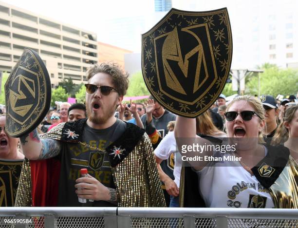 Vegas Golden Knights fans Dylan Eggert and Gina Eggert, both of of Nevada, cheer during a Golden Knights road game watch party for Game Three of the...