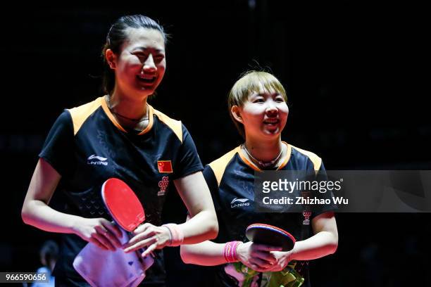 Zhu Yuling and Zhu Yuling of China celebrate at the women's doubles final compete with Jeon Jihee and Yang Haeun of South Korea during the 2018 ITTF...