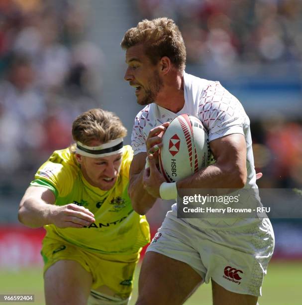 Tom Mitchell of England and Ben O'Donnell of Australia during the HSBC London Sevens quarter final at Twickenham Stadium on June 3, 2018 in London,...