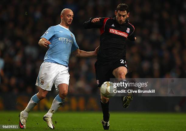 Rory Delap of Stoke City competes for the ball with Stephen Ireland of Manchester City during the FA Cup sponsored by E.ON Fifth round match match...