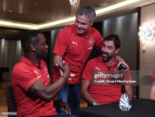 Arsenal Legends Lauren, Anders Limpar and Robert Pires in the team hotel before the match between Real Madrid CL Legends and Arsenal FC Legends at...