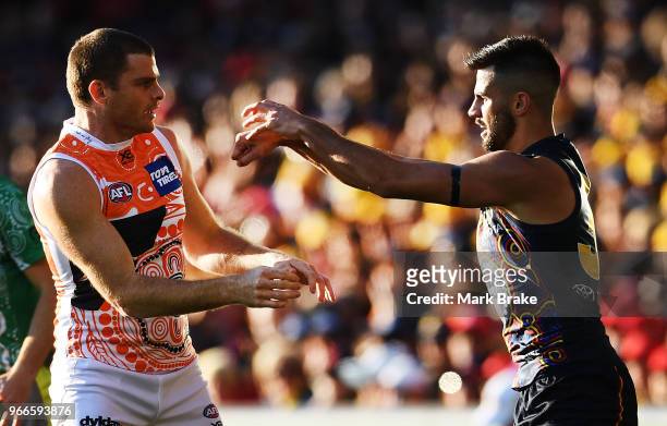 Heath Shaw of the Giants lines and Wayne Milera of the Adelaide Crows front up during the round 11 AFL match between the Adelaide Crows and the...