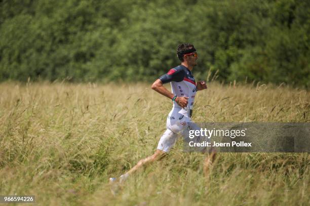 Jan Frodeno competes in the running leg during the Sparkasse IRONMAN 70.3 Kraichgau powered by KraichgauEnergie on June 3, 2018 in Kraichgau, Germany.