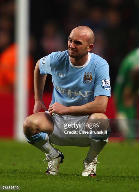 Stephen Ireland of Manchester City grimaces during the FA Cup sponsored by E.ON Fifth round match match between Manchester City and Stoke City at the...