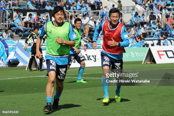 Daisuke Matsui of Yokohama FC and Kazuyoshi Miura of Yokohama FC looks on prior to the J.League J2 match between Yokohama FC and Tokyo Verdy at...