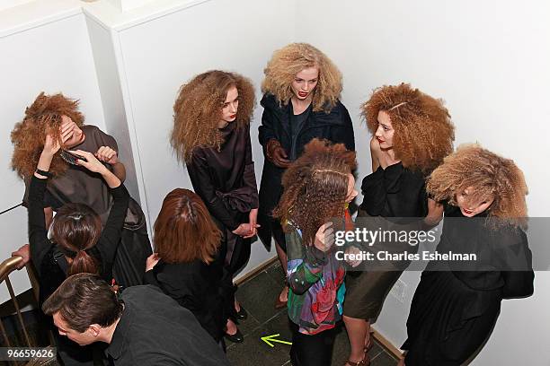 Models preparing backstage at the United Bamboo Fall/Winter 2010 fashion show during Mercedes-Benz Fashion Week at the Altman Building on February...