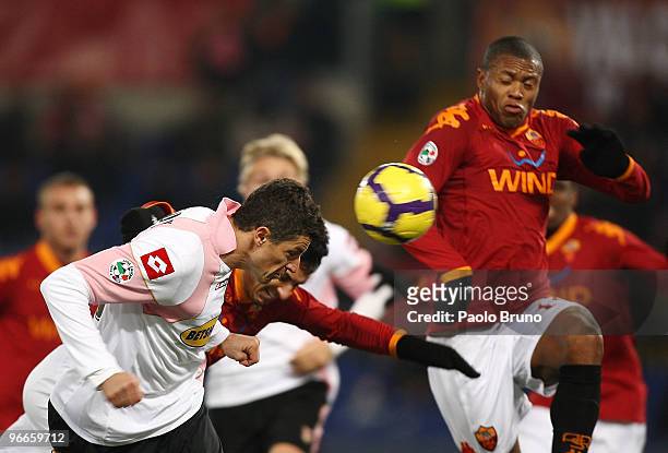 Julio Baptista of AS Roma and Igor Budan of US Citta' di Palermo in action during the Serie A match between AS Roma and US Citta di Palermo at Stadio...