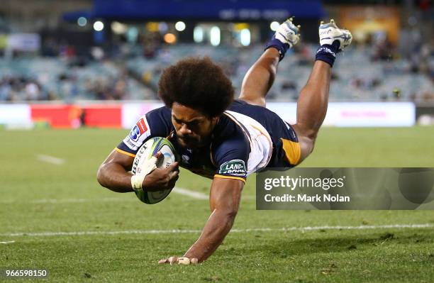 Henry Speight of the Brumbies scores a try during the round 16 Super Rugby match between the Brumbies and the Sunwolves at GIO Stadium Stadium on...