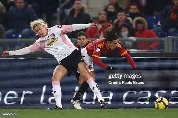 Rodrigo Taddei of AS Roma and Simon Kjaer of US Citta' di Palermo in action during the Serie A match between AS Roma and US Citta di Palermo at...