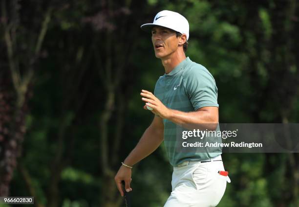 Thorbjorn Olesen of Denmark acknowledges the crowd after his birdie on the 13th hole during the final round of the Italian Open at Gardagolf Country...