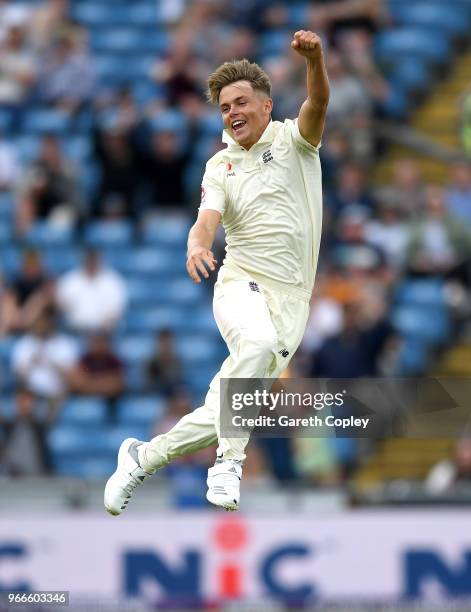 Sam Curran of England celebrates dismissing Shadab Khan of Pakistan during day three of the 2nd NatWest Test match between England and Pakistan at...