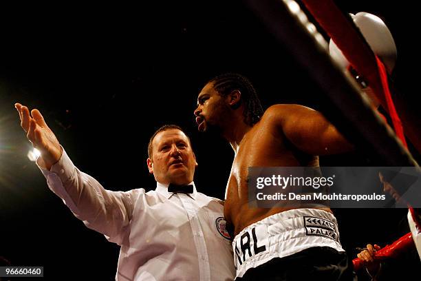 Carl Baker of Shefield ooks dejected after the referee stops his fight against Dereck Chisora of Finchley in their Eliminator for British Heavyweight...