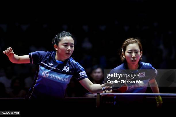 Jeon Jihee and Yang Haeun of South Korea in action at the women's doubles final compete with Zhu Yuling and Zhu Yuling of China during the 2018 ITTF...