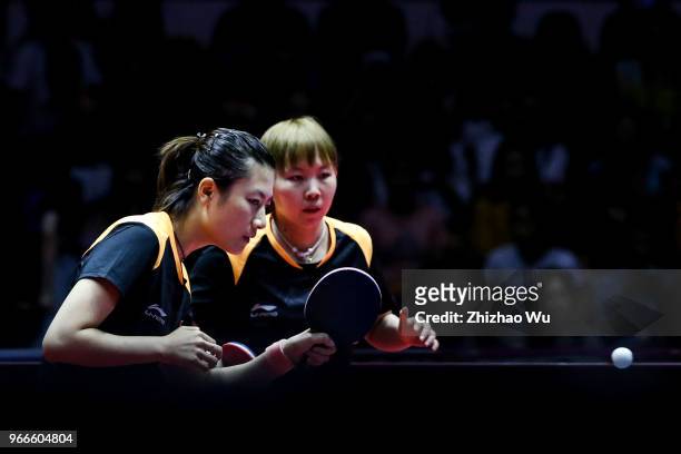 Zhu Yuling and Zhu Yuling of China in action at the women's doubles final compete with Jeon Jihee and Yang Haeun of South Korea during the 2018 ITTF...
