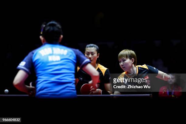 Zhu Yuling and Zhu Yuling of China in action at the women's doubles final compete with Jeon Jihee and Yang Haeun of South Korea during the 2018 ITTF...
