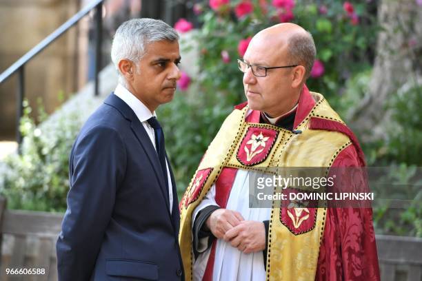 Mayor of London Sadiq Khan is greeted by the Dean of Southwark, Andrew Nunn on her arrival for a Service of Commemoration on the first anniversary of...