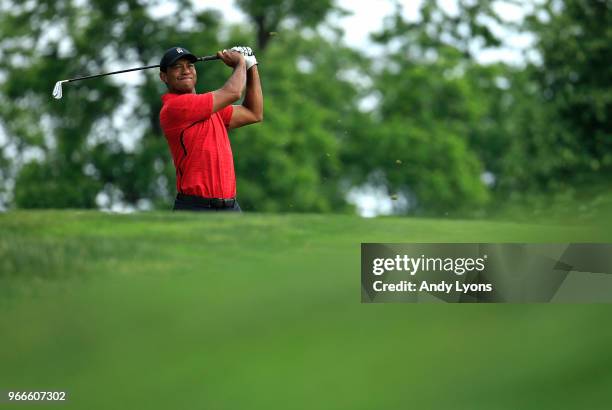 Tiger Woods watches his tee shot on the third hole during the final round of The Memorial Tournament Presented by Nationwide at Muirfield Village...