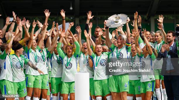 The Team of Wolfsburg celebrate the champion chip after the Allianz Frauen Bundesliga match between VfL Wolfsburg and 1. FC Koeln at AOK-Stadion on...