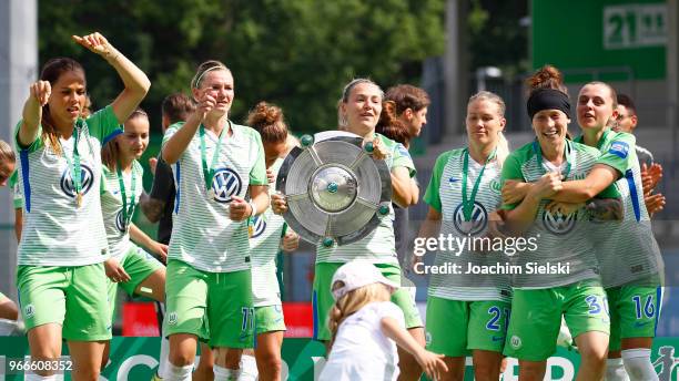 The Team of Wolfsburg celebrate the champion chip after the Allianz Frauen Bundesliga match between VfL Wolfsburg and 1. FC Koeln at AOK-Stadion on...