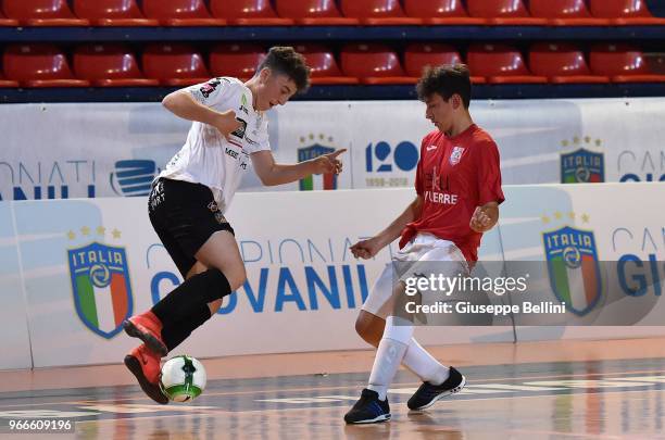 Player of Team of La Meridiana and Player of Team of Aosta in action during "Finali Nazionali Allievi e Giovanissimi Calcio a Cinque" Youth Soccer...