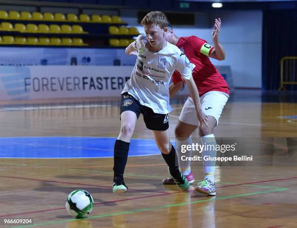 Player of Team of La Meridiana and Player of Team of Aosta in action during "Finali Nazionali Allievi e Giovanissimi Calcio a Cinque" Youth Soccer...