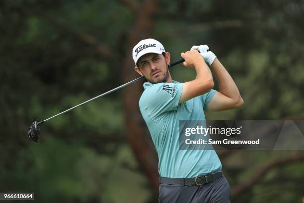 Patrick Cantlay watches his tee shot on the second hole during the final round of The Memorial Tournament Presented by Nationwide at Muirfield...