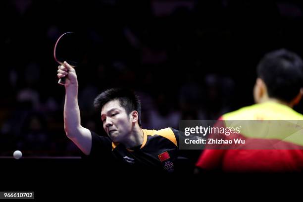 Fan Zhendong of China in action at the men's singles final compete with Ma Long of China during the 2018 ITTF World Tour China Open on June 3, 2018...