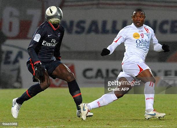 Nancy's forward Paul Alo'O Efoulou vies with Paris Saint Germain's defender Zoumana Camara during the French L1 football match at the Marcel Picot...