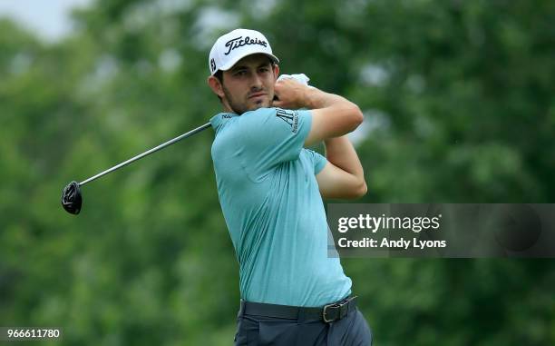 Patrick Cantlay watches his tee shot on the fifth hole during the final round of The Memorial Tournament Presented by Nationwide at Muirfield Village...