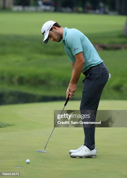 Patrick Cantlay plays a shot on the third hole during the final round of The Memorial Tournament Presented by Nationwide at Muirfield Village Golf...