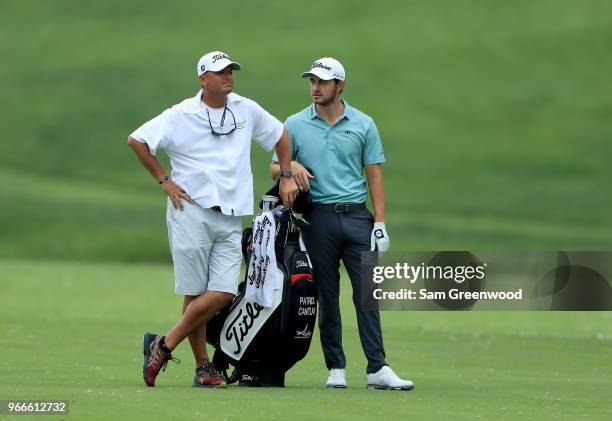 Patrick Cantlay plays a shot on the third hole during the final round of The Memorial Tournament Presented by Nationwide at Muirfield Village Golf...