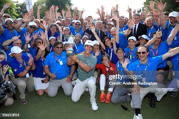 Thorbjorn Olesen of Denmark poses with the Italian Open trophy after victory in the competition during the final round of the Italian Open at...