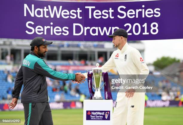 England captain Joe Root shakes hands with Pakistan captain Sarfraz Ahmed after drawing the NatWest Test Series between England and Pakistan at...