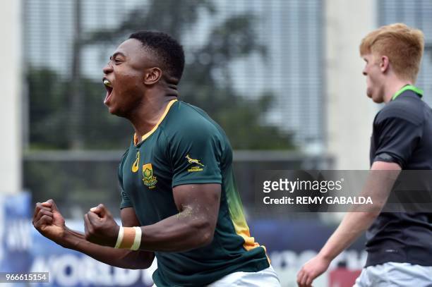 South Africa's center Wandisile Simelane celebrates after scoring a try during the World Rugby U20 Championship match South Africa vs Ireland at the...