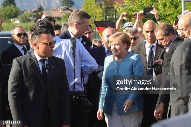 German Chancellor Angela Merkel arrives with DFB president Reinhard Grindel at the team hotel Hotel Weinegg of the German national team a during her...
