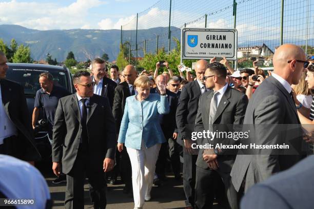 German Chancellor Angela Merkel arrives with DFB president Reinhard Grindel at the team hotel Hotel Weinegg of the German national team a during her...