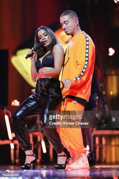Anitta and J Balvin perform on stage during the MIAW Awards 2018 at Arena Ciudad de Mexico on June 2, 2018 in Mexico City, Mexico
