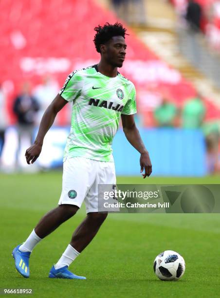 Ola Aina of Nigeria warms up before the International Friendly match between England and Nigeria at Wembley Stadium on June 2, 2018 in London,...