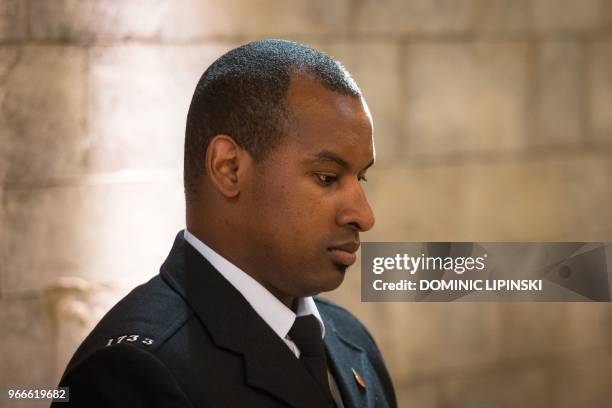 British Transport Police officer, Wayne Marques, who seriously injured fighting off the London Bridge attackers, attends a Service of Commemoration...