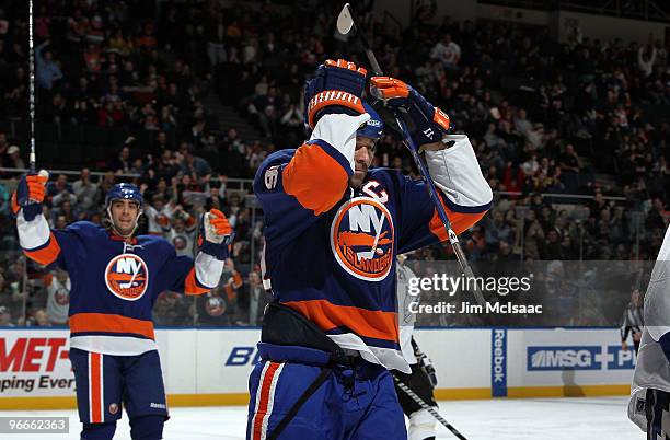 Doug Weight of the New York Islanders reacts after scoring his first goal of the season in the second period against the Tampa Bay Lightning as...