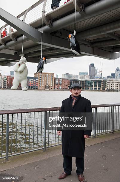 Suicide Penguins' by Taiwanese artist Vincent Huang hangs from the Millennium Bridge on February 13, 2010 in London, England. The installation is...