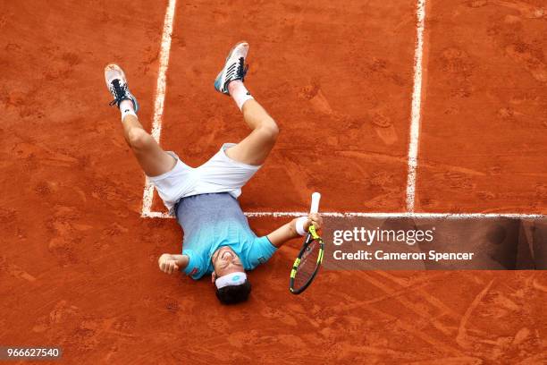 Marco Cecchinato of Italy celebrates victory during the mens singles fourth round match against David Goffin of Belgium during day eight of the 2018...