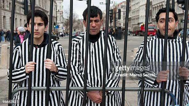Members of the Iranian Community dressed as political prisoners in Parliament Square in support of anti government protestors in Iran on February 13,...
