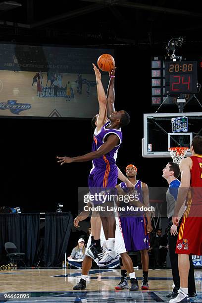 Earl Barron of the East All-Star Team battles Brian Butch of the West All-Star Team for the jumpball during the NBA D-League All-Star Game on center...