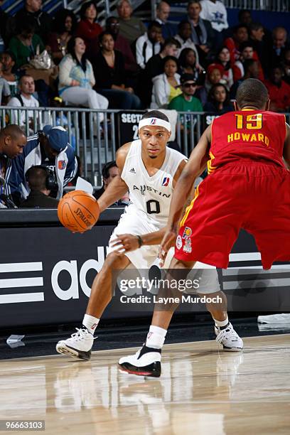Curtis Jerrells of the West All-Star Team drives against Ron Howard of the East All-Star Team during the NBA D-League All-Star Game on center court...