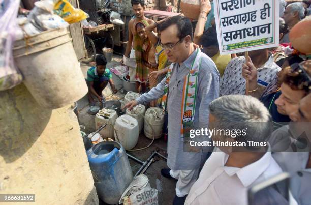 Delhi Pradesh Congress Committee President Ajay Maken during the 'Jal Satyagraha' protest against the acute shortage of drinking water in the slum...