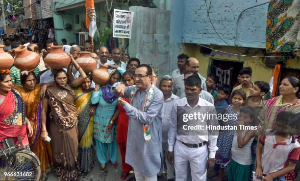 Delhi Pradesh Congress Committee President Ajay Maken during the 'Jal Satyagraha' protest against the acute shortage of drinking water in the slum...