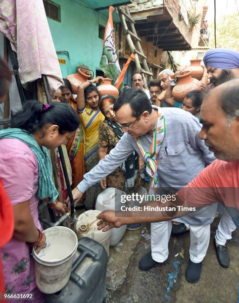 Delhi Pradesh Congress Committee President Ajay Maken during the 'Jal Satyagraha' protest against the acute shortage of drinking water in the slum...