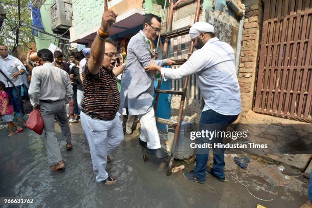 Delhi Pradesh Congress Committee President Ajay Maken during the 'Jal Satyagraha' protest against the acute shortage of drinking water in the slum...