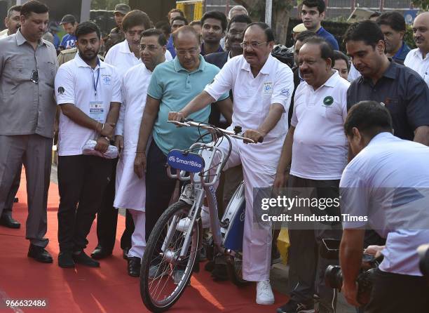 Vice President Venkaiah Naidu unveils the Smart Bike on the occasion of World Bicycle Day 2018 in the presence of Union Minister for Science &...